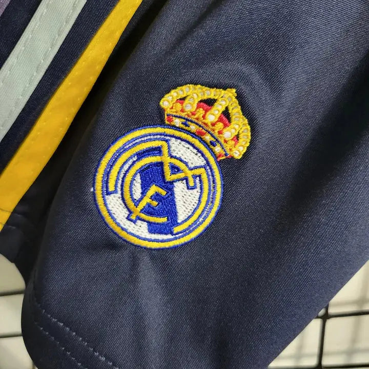 MAILLOT ENFANT REAL MADRID EXTERIEUR 2023/2024 Onze Maillots