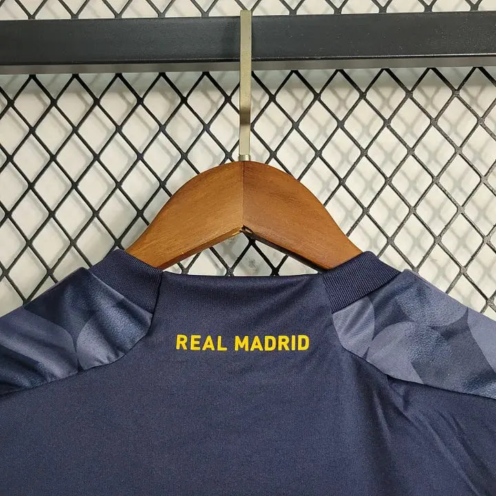 MAILLOT ENFANT REAL MADRID EXTERIEUR 2023/2024 Onze Maillots