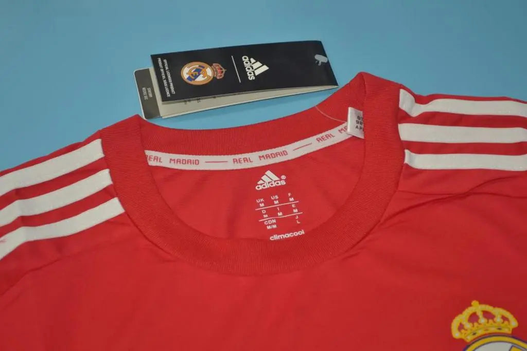 MAILLOT REAL MADRID EXTÉRIEUR 2011/2012 VERSION MANCHES LONGUES - MODAFOOT