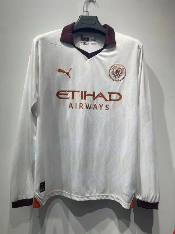 MAILLOT MANCHESTER CITY EXTÉRIEUR 2023/2024 VERSION MANCHES LONGUES - MODAFOOT